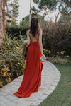 v-neckline-orange-red-evening-gown-with-strapy-back-1