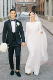 Vintage-Inspired Wedding Gown with Long Sleeves
